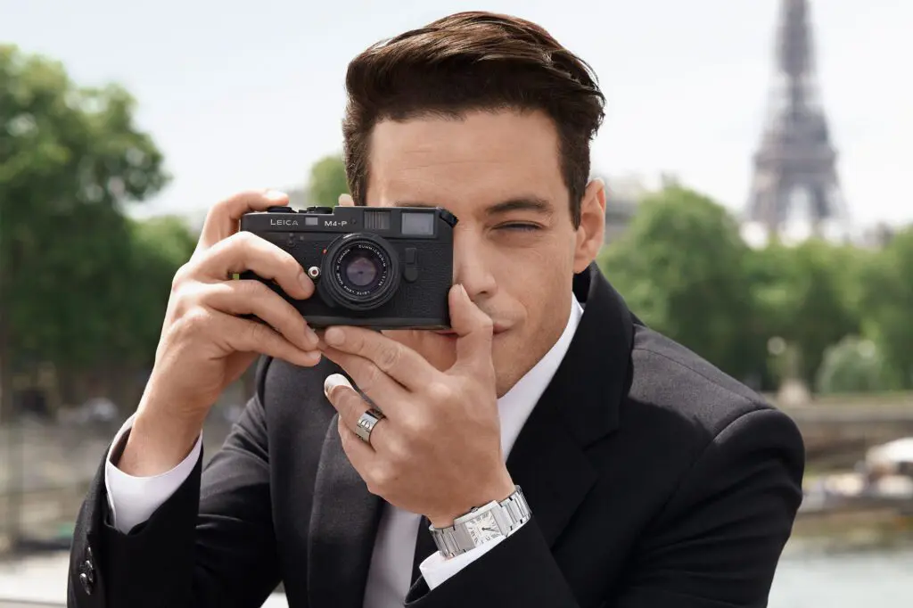 Tank française: un mito de cartier que se renueva Rami malek catherine deneuve